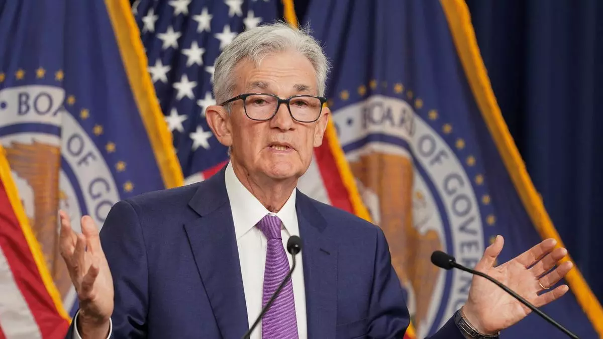 Fed holds rates steady, signals caution amid inflation concerns